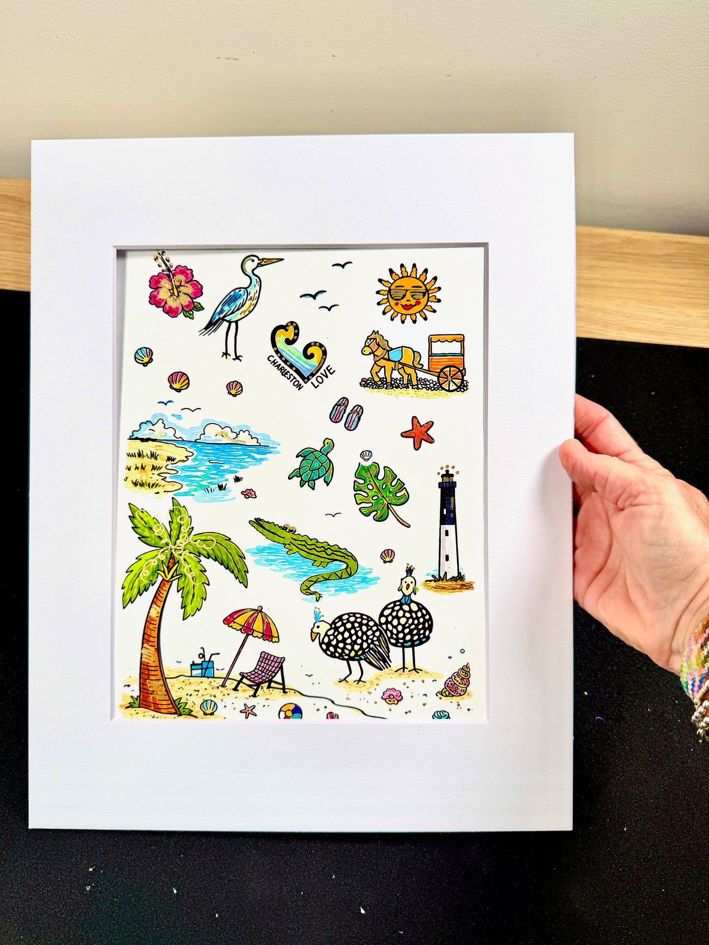 Framed Charleston Charm artist embellished print displayed in a white mat frame.
