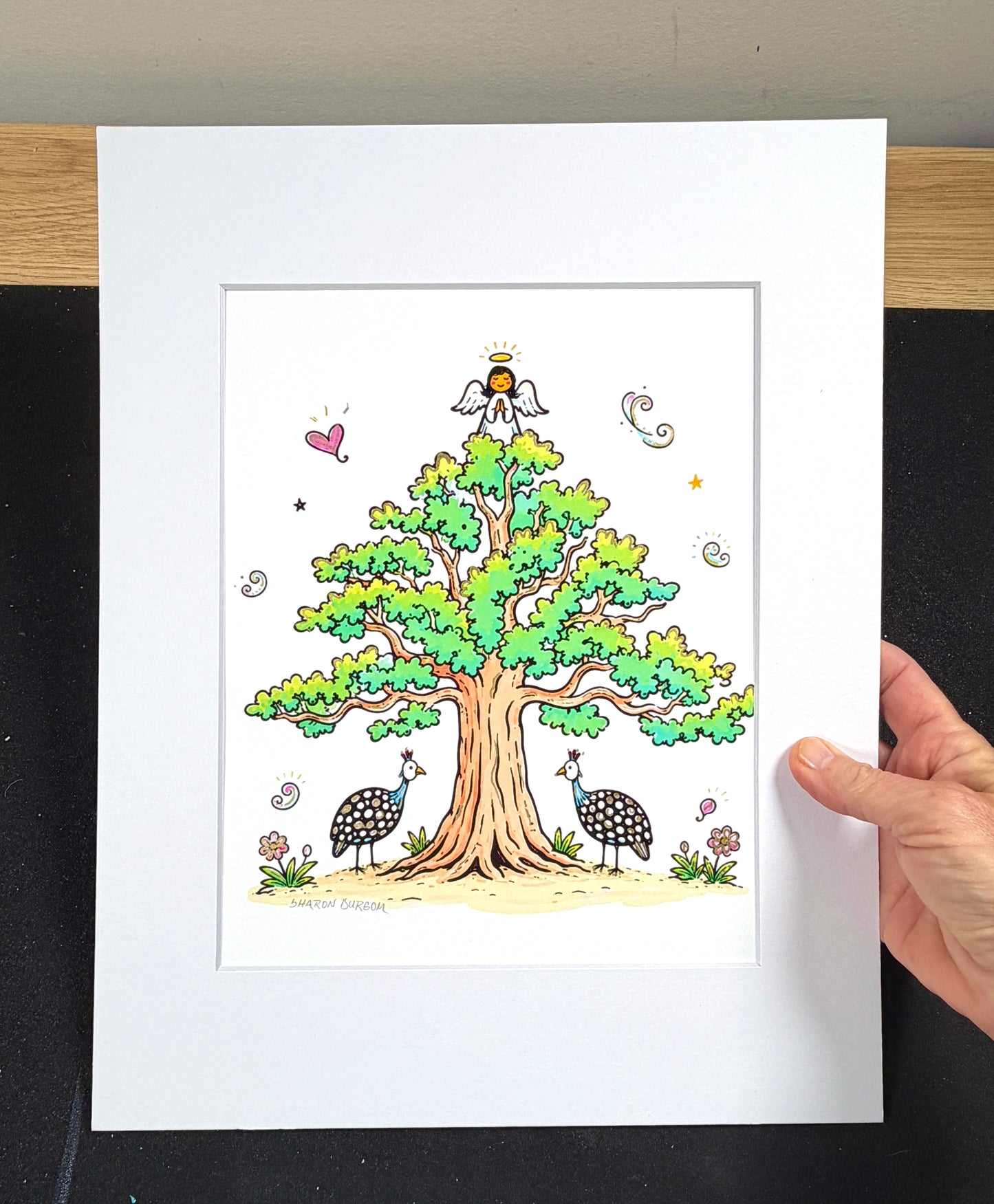 Framed Angel Oak artist embellished print displayed in a white mat.
